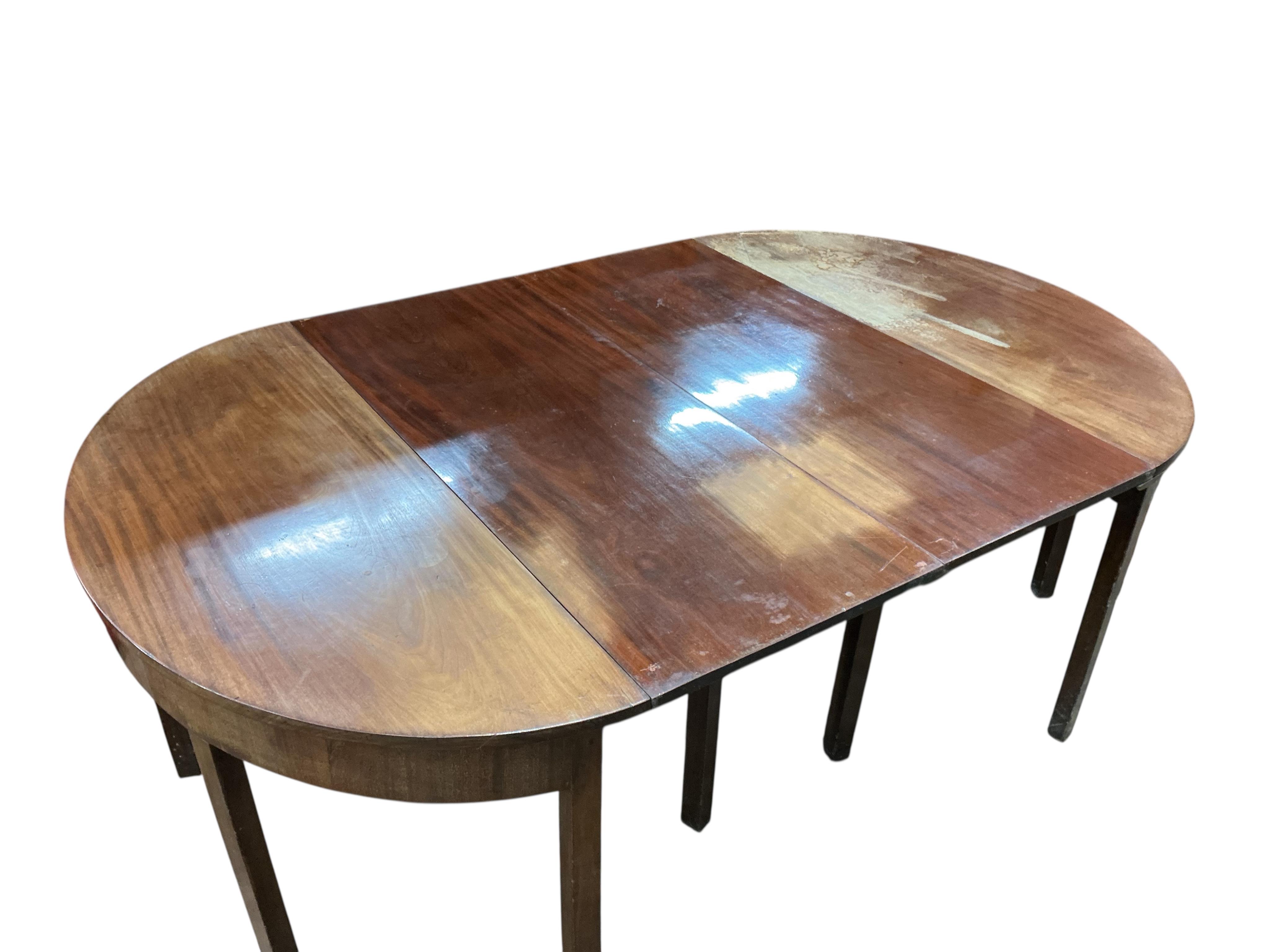 A George III mahogany D end extending dining table, 208cm extended, two spare leaves, depth 131cm, height 72cm